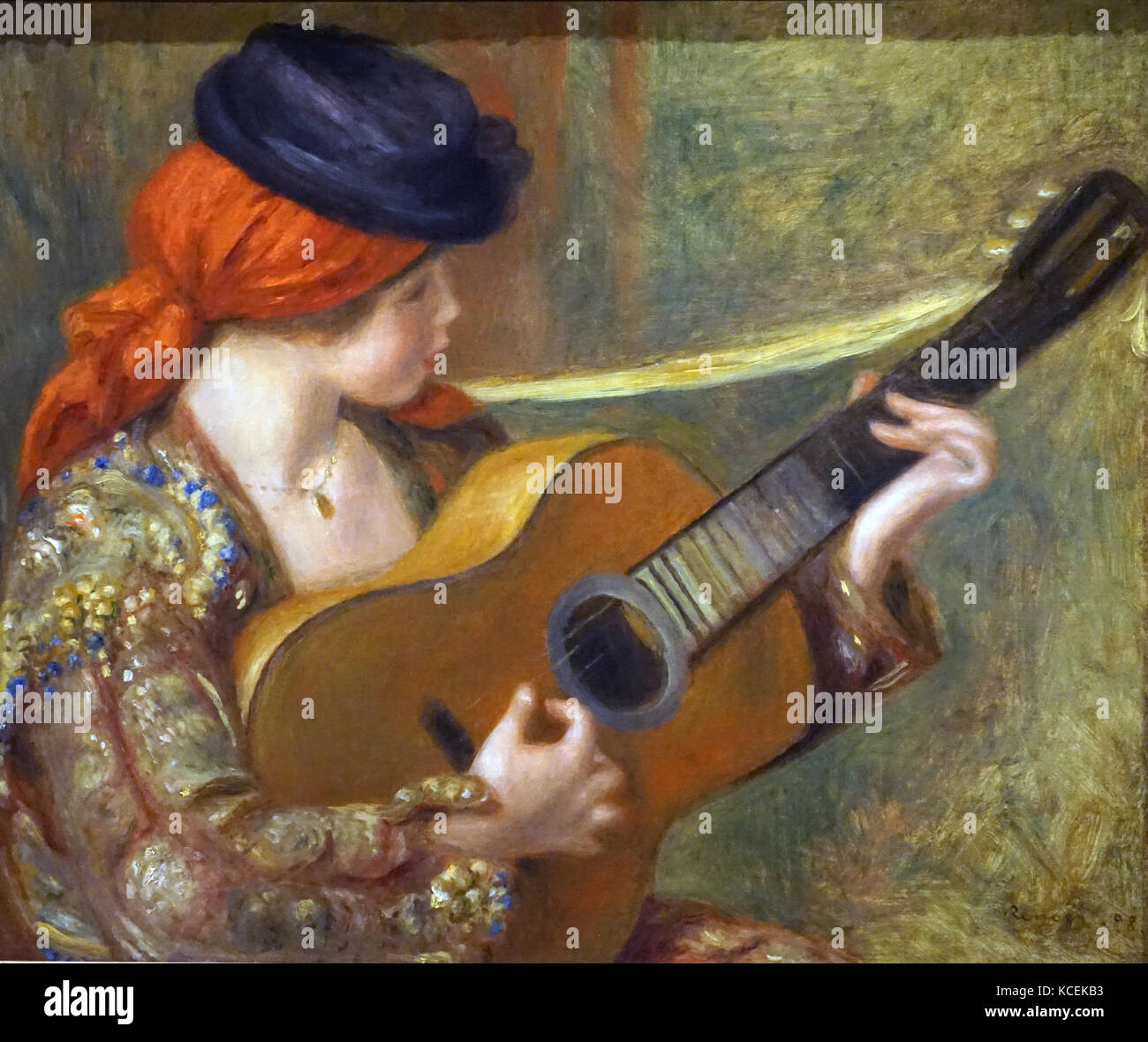 Pittura intitolato "giovane donna spagnola con una chitarra' di Pierre-Auguste Renoir (1841-1919) un artista francese di stile impressionista. Datata del XIX secolo Foto Stock