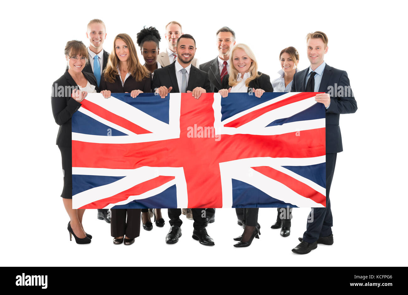 Happy businessman Holding Unione Jack contro uno sfondo bianco Foto Stock