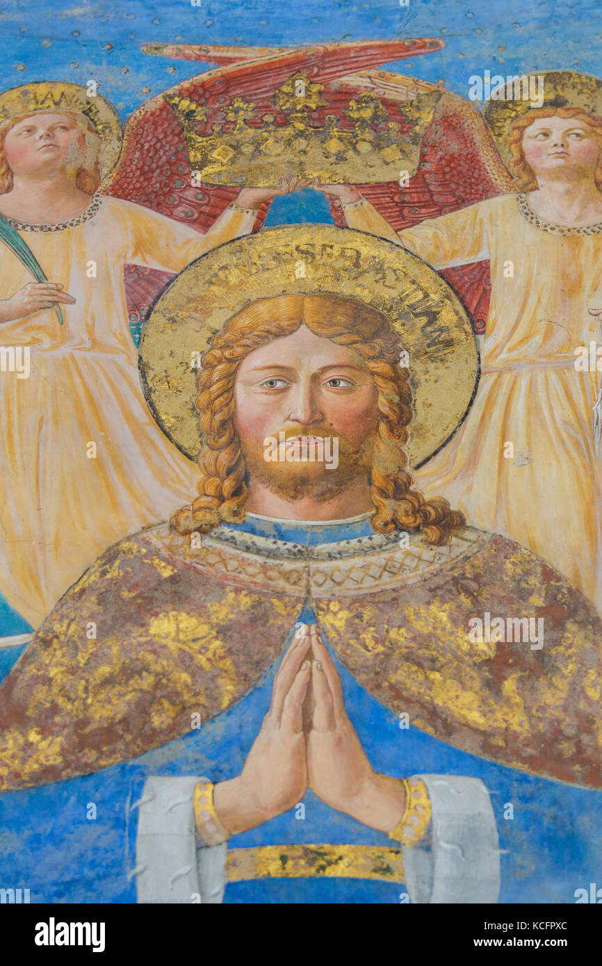 Affresco di san sebastian con devoti nella chiesa di sant Agostino a San Gimignano, Toscana, Italia, creato da Benozzo Gozzoli nel 1464. Foto Stock