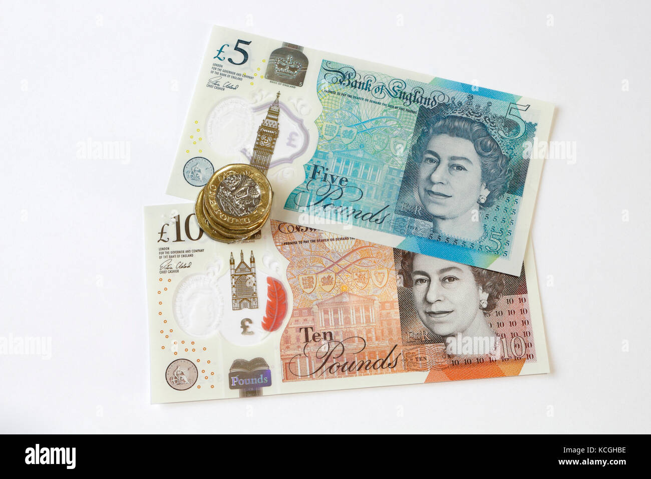 Nuovo cinque e dieci pound note con cancelletto monete, REGNO UNITO Foto Stock