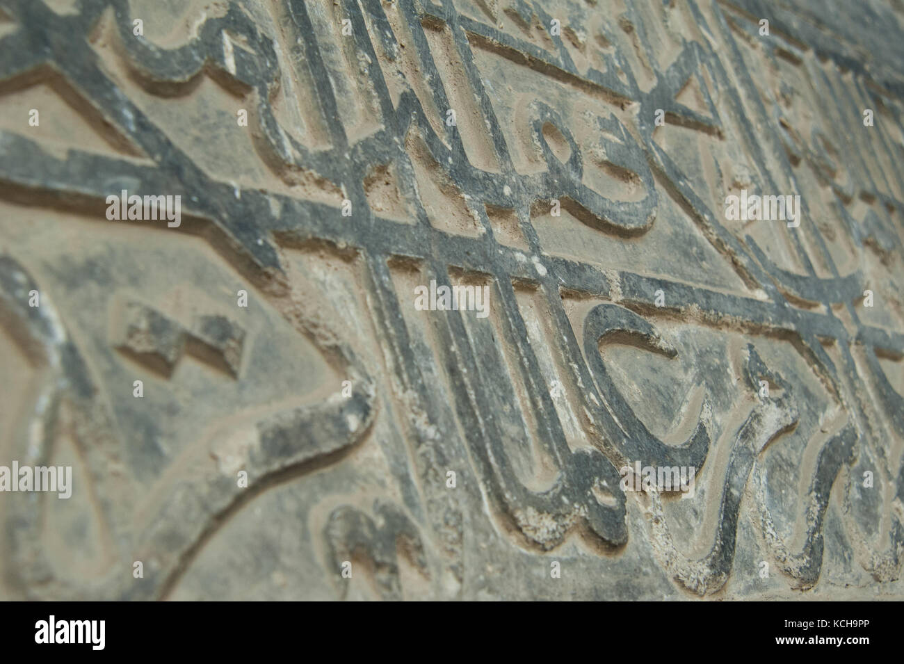 Antica scrittura araba sulla parete Foto Stock