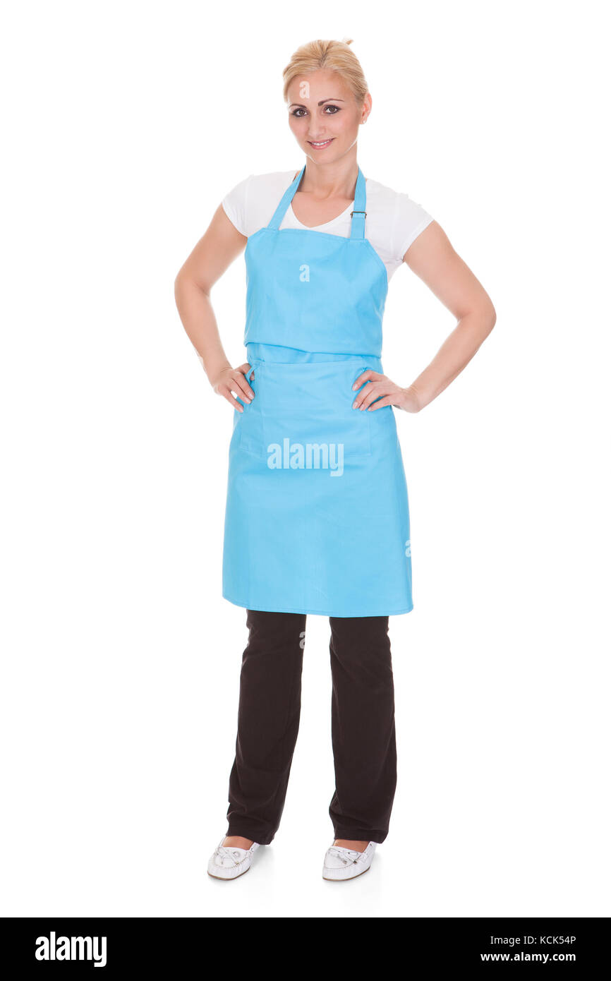 Donna felice indossando Grembiule da cucina su sfondo bianco Foto