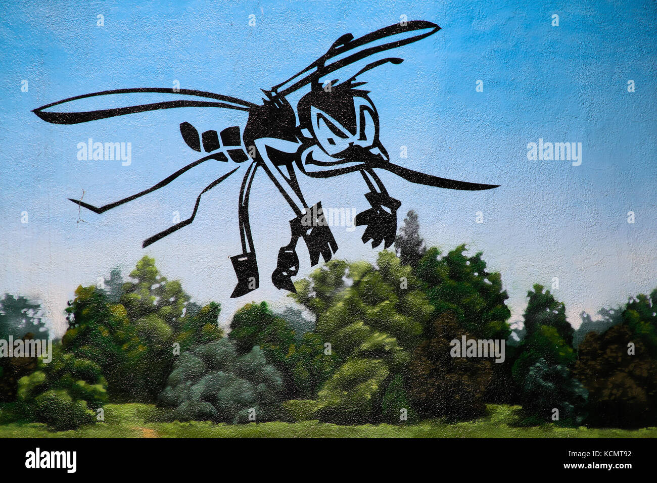 Zanzara enorme su un muro di casa, grafitti. Foto Stock