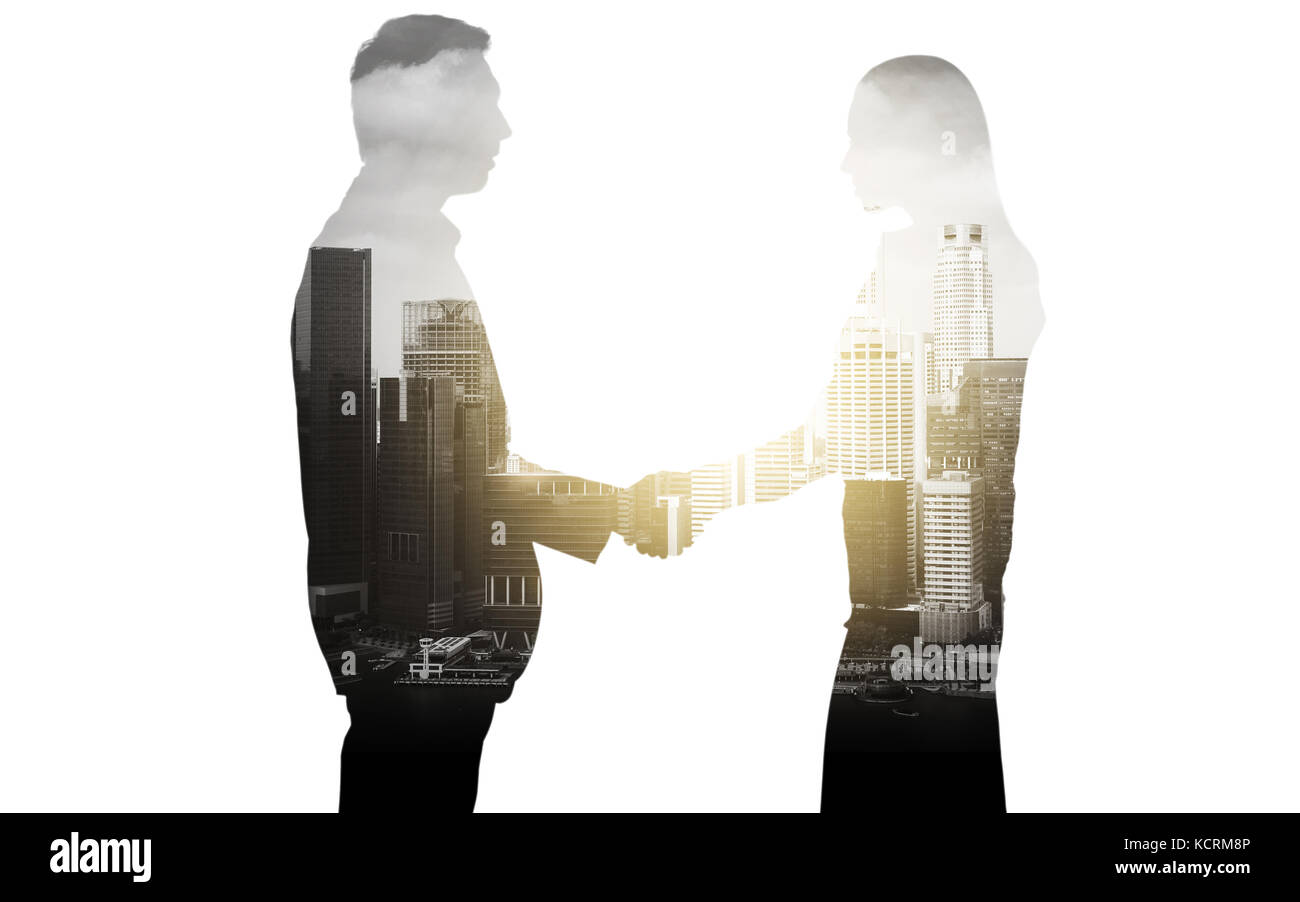 La gente di affari stringono le mani su sfondo della città Foto Stock
