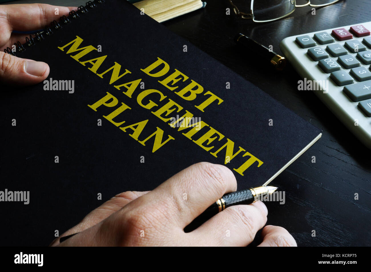 Gestione di concetto di debito. prenota con titolo di debito piano di gestione (DMP). Foto Stock