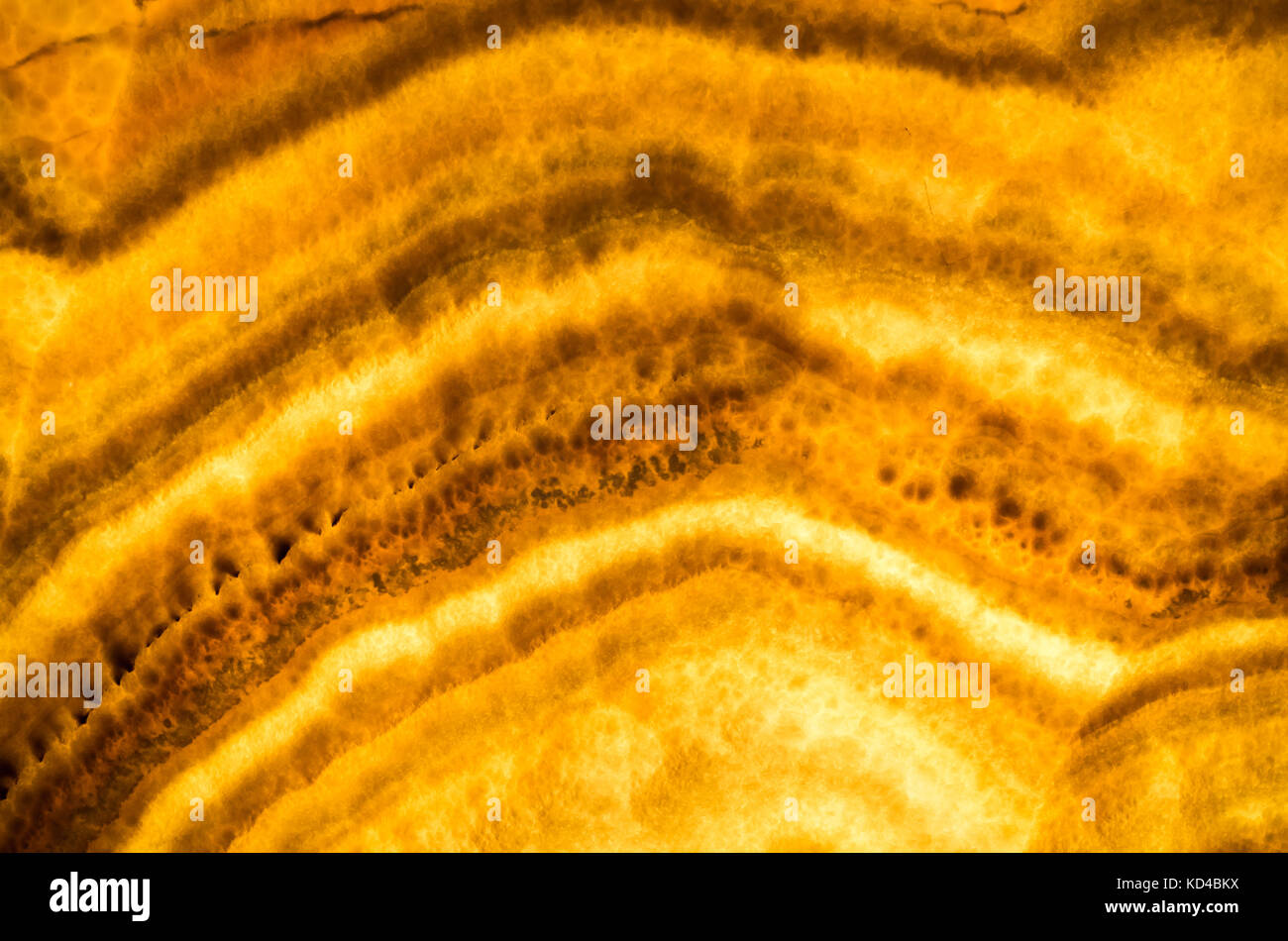 Il miele onice, decorativi in pietra pannello parete, closeup foto di sfondo texture Foto Stock