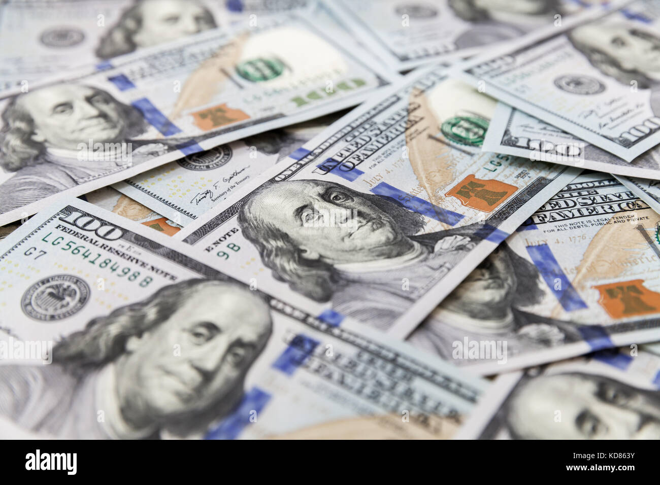 Stati Uniti valuta ufficiale, un centinaio di dollari note di fondo foto con messa a fuoco selettiva Foto Stock