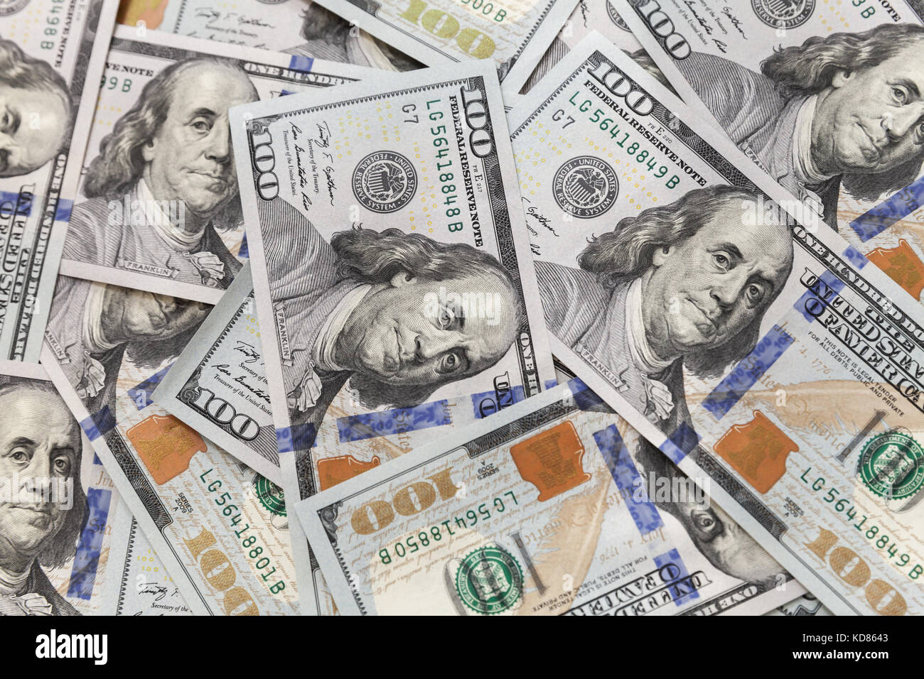 Stati Uniti valuta ufficiale, un centinaio di dollari note texture di sfondo Foto Stock