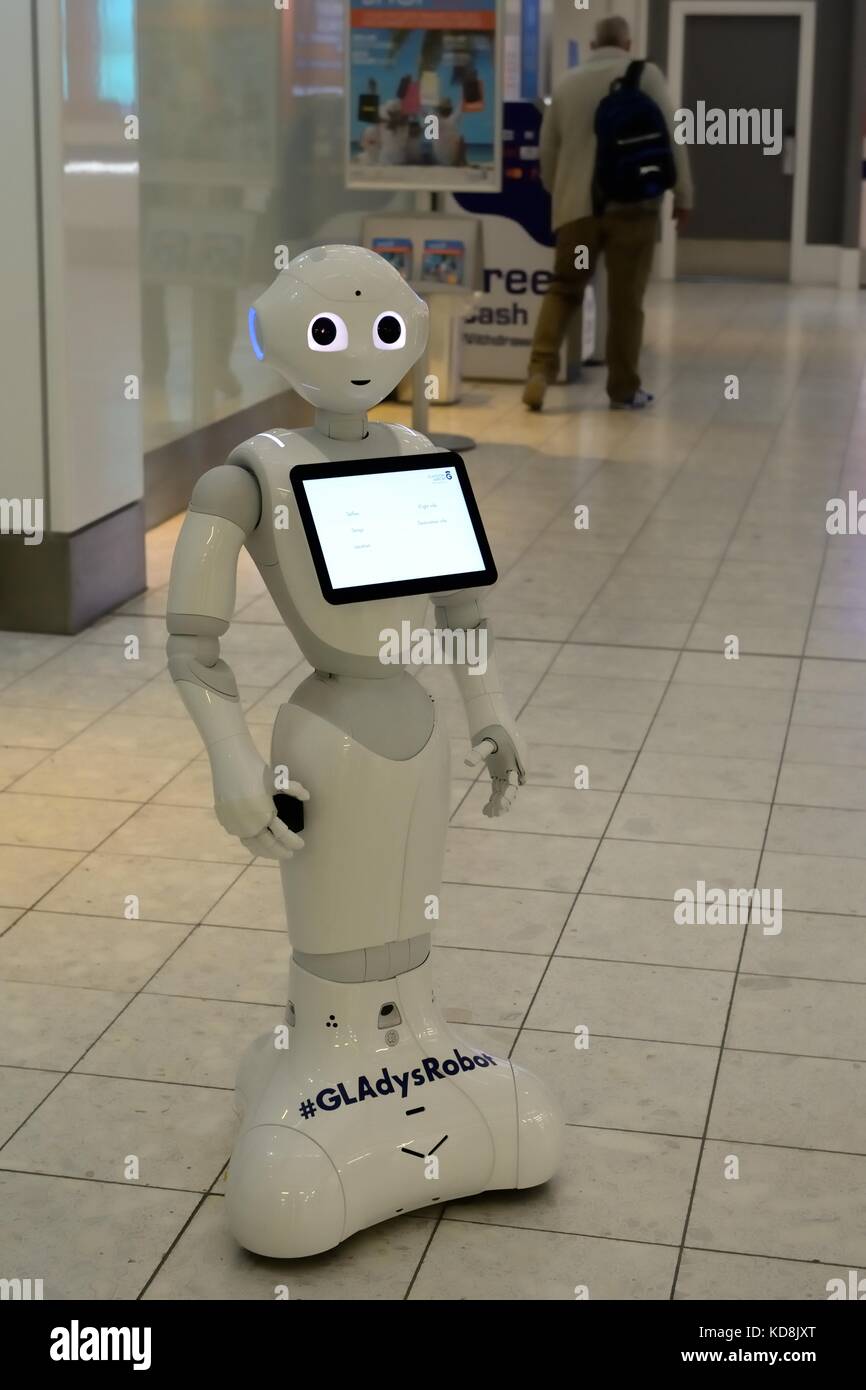 Robot umanoide ambasciatore all'Aeroporto Internazionale di Glasgow, Scotland, Regno Unito Foto Stock