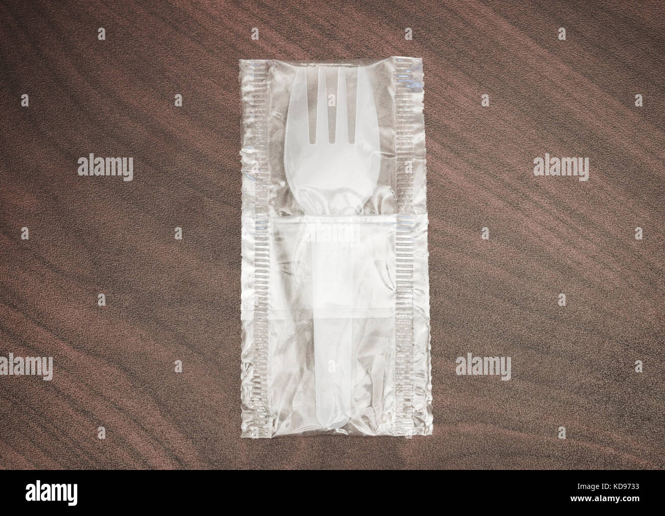 In plastica usa e getta la forcella nel sacchetto trasparente Foto Stock