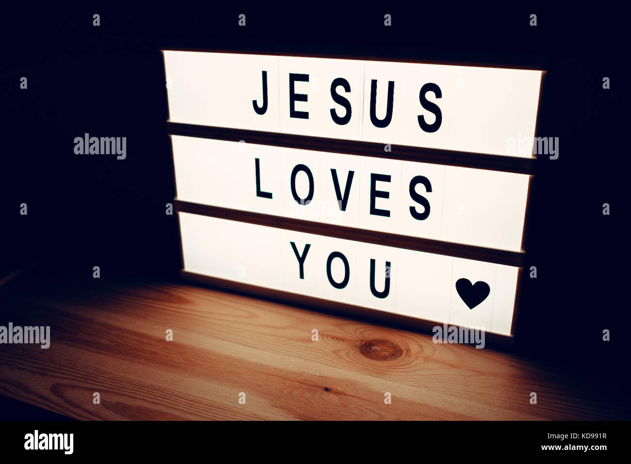 Gesù vi ama, messaggio religioso lightbox, concetto del cristianesimo e della fede in Dio Foto Stock