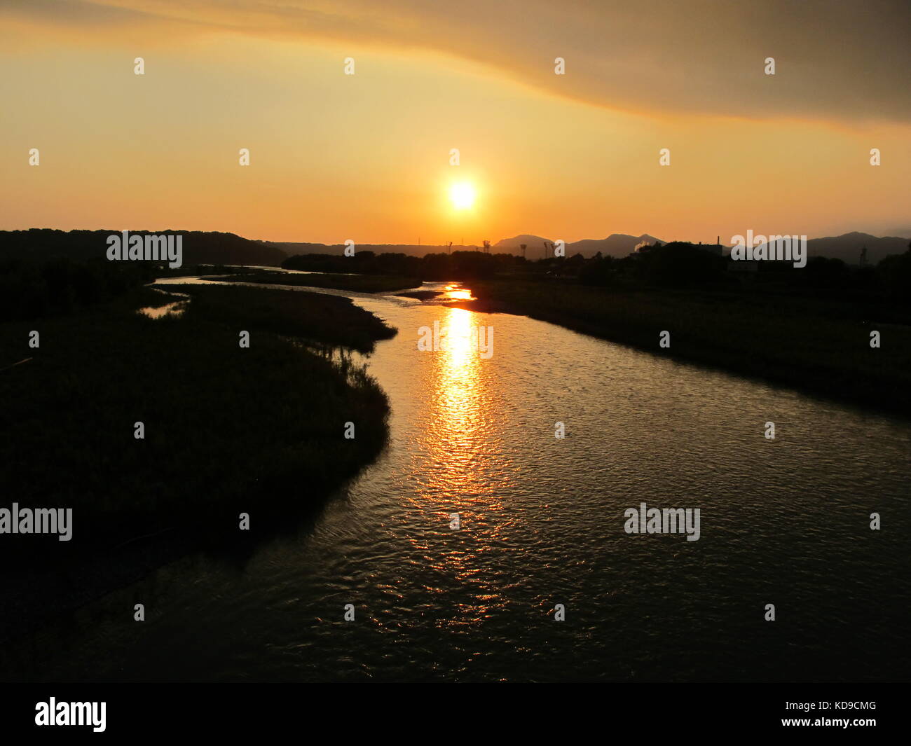 Ponte horai tramonto sul fiume ooi Foto Stock
