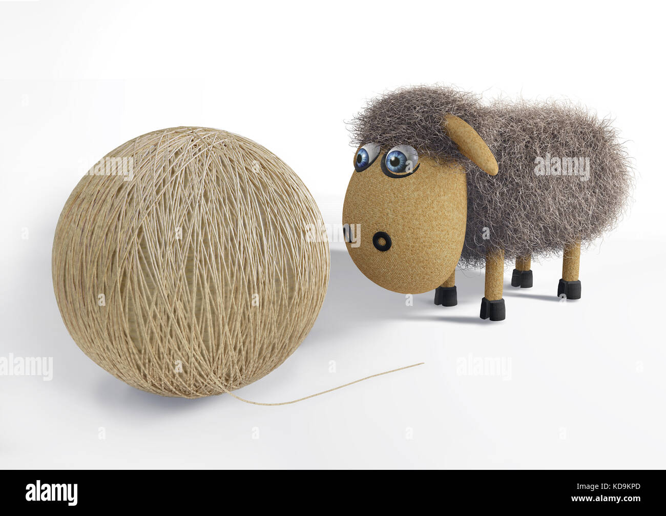 Pecore giocattolo guarda la sfera di filo Foto Stock