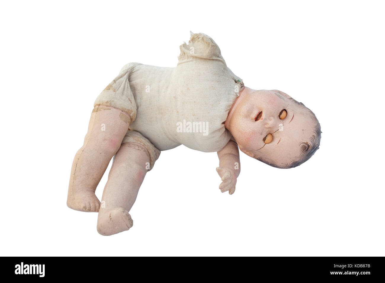 Scary spooky vintage baby doll. Isolato. Verticale. Foto Stock