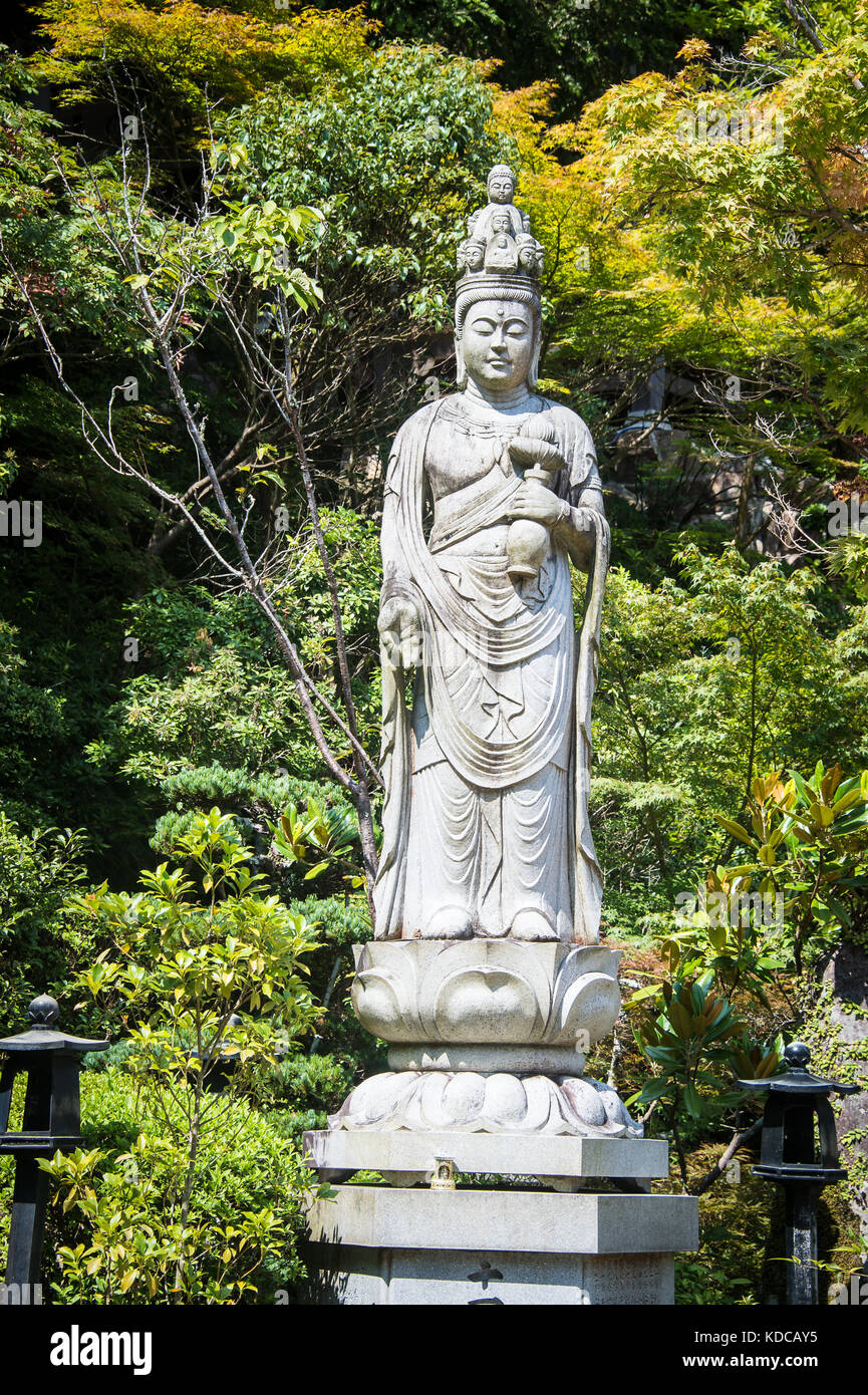 Statue di Divinità buddiste a daisho-nel tempio, Miyajima, Giappone Foto Stock