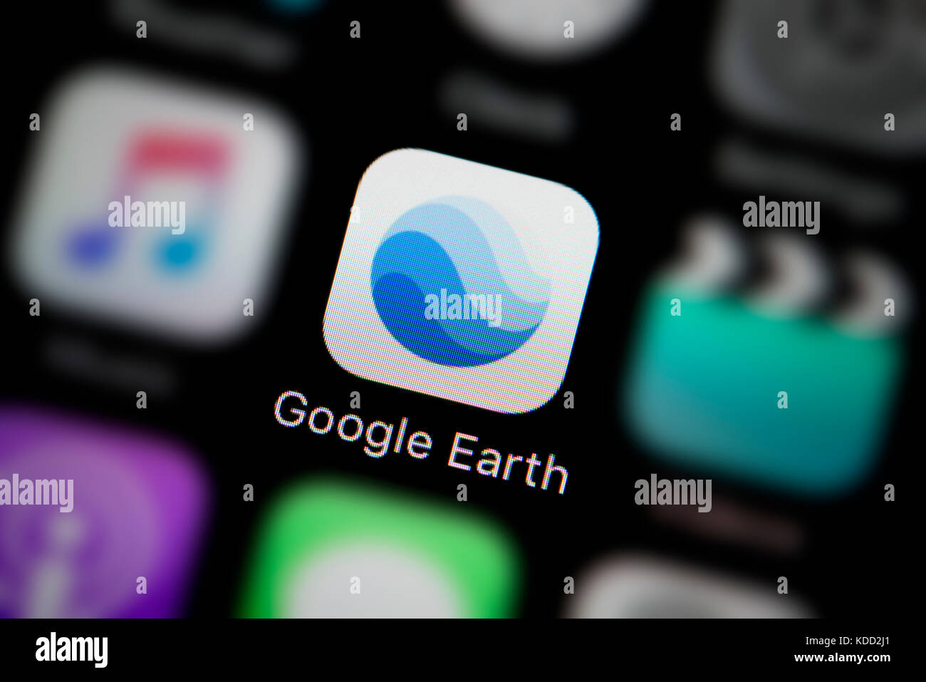 Una inquadratura ravvicinata del logo che rappresenta Google Earth Icona app, come si vede sullo schermo di un telefono intelligente (solo uso editoriale) Foto Stock