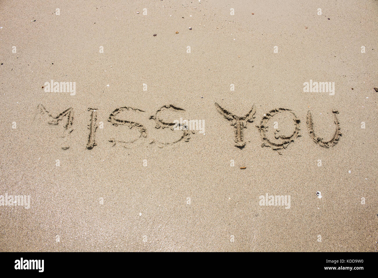Miss you sulla sabbia, immagine concetto e idea Foto Stock
