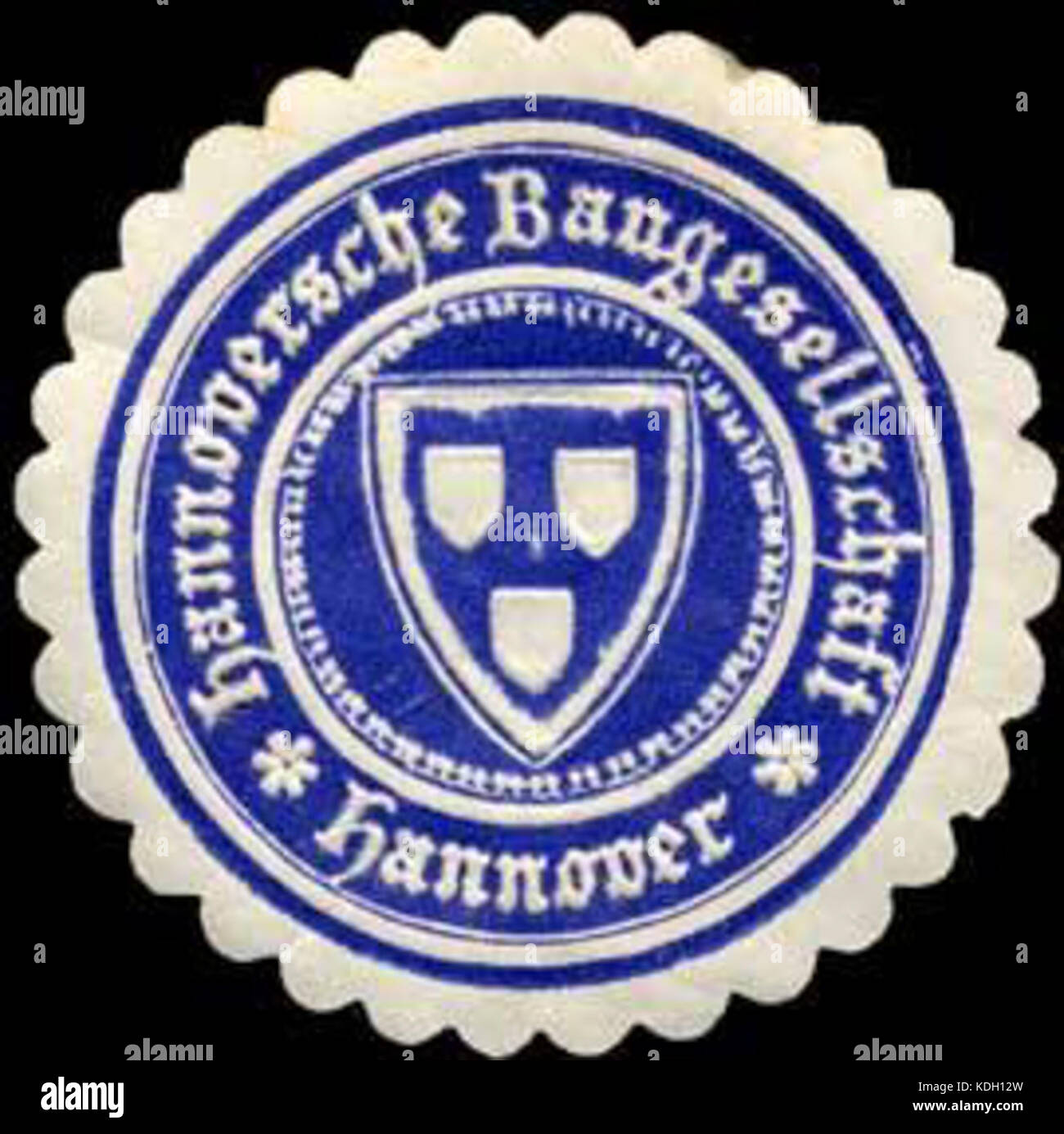 Un'immagine del sigillo dell'Hannover Baugesellschaft, un'impresa di costruzioni di Hannover, Germania, che illustra il suo significato storico nello sviluppo della regione. Foto Stock