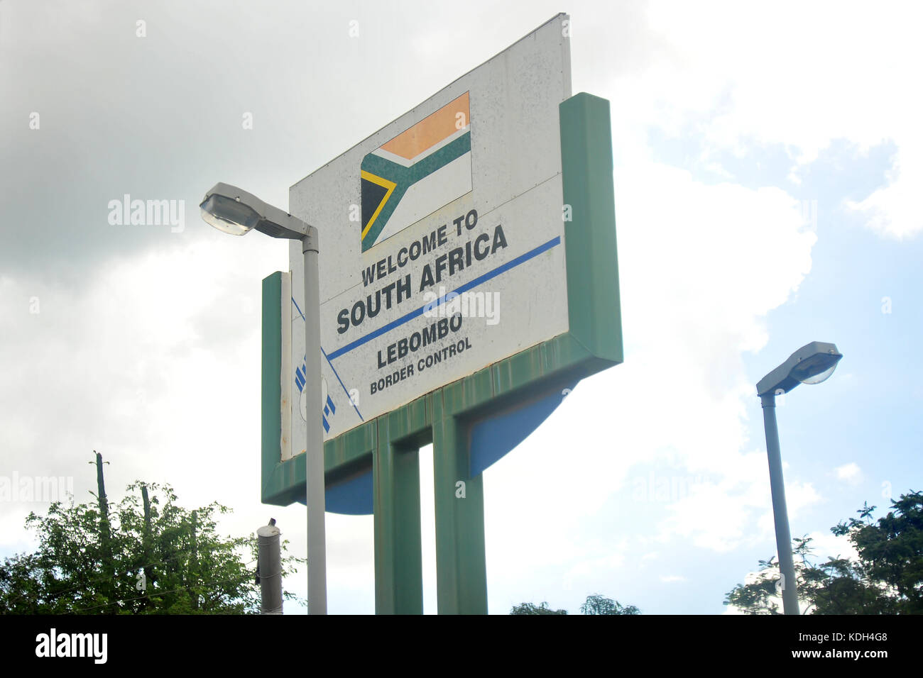 Un benvenuto a South African firmare visto dal Mozambico. Foto Stock