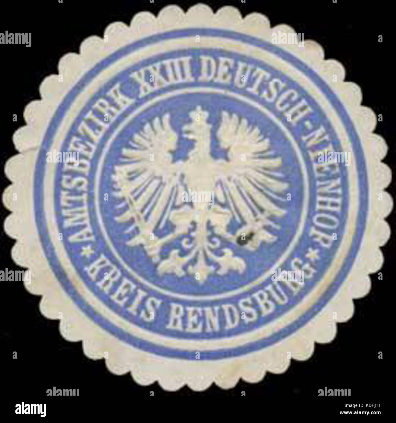 Il Siegelmarke (sigillo) di Amtsbezirk XXIII Deutsch Nienhof è un marchio postale storico utilizzato per scopi amministrativi nella regione tedesca. Questo francobollo fa parte di una più ampia raccolta di storia postale del periodo. Foto Stock