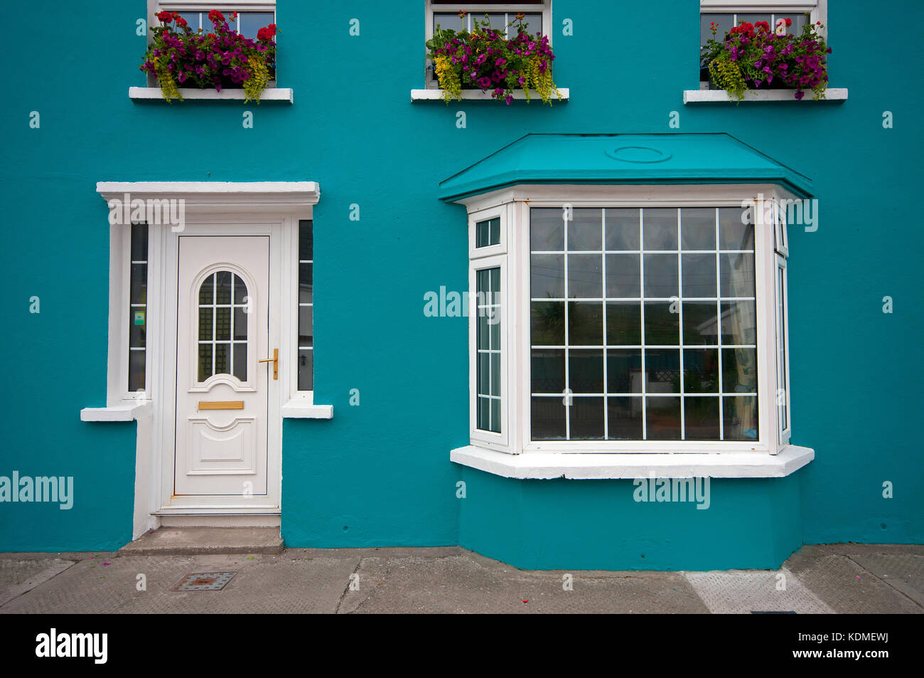 La facciata della casa a Portmagee, nella contea di Kerry, Irlanda Foto Stock