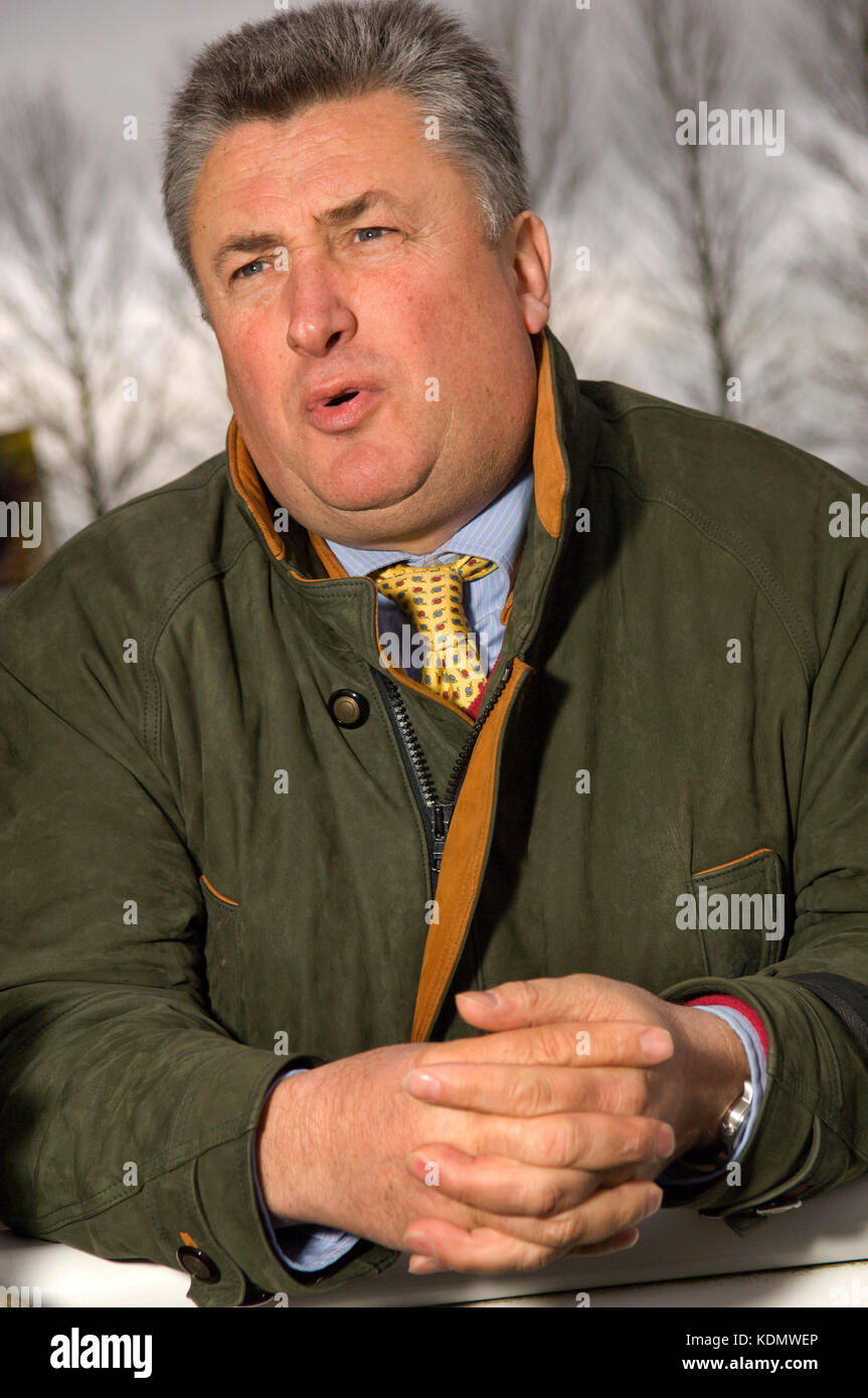 Horsetrainer Paul Nicholls a Wincanton Racecourse con delle corse ippiche 'Kauto Star', jokeys Darryl Jacob (tappo blu) e Ruby Walsh (cappuccio bianco) Foto Stock