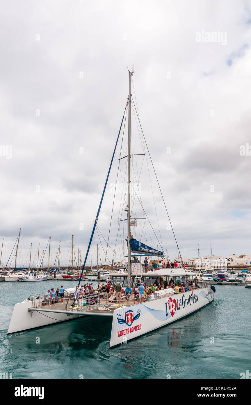 I turisti a bordo di un catamarano, Graciosa Island, Isole Canarie Foto Stock