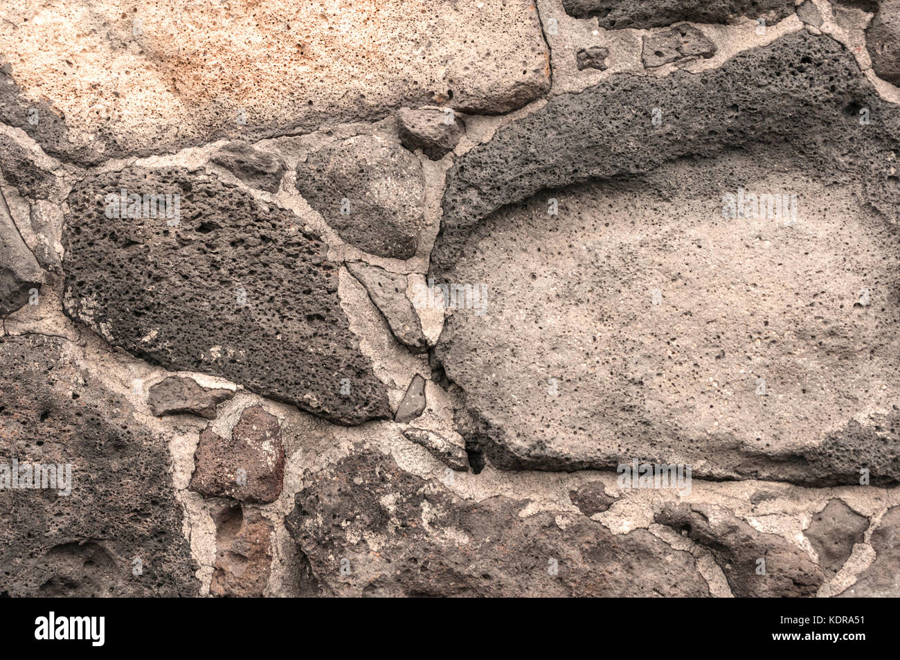 Vecchio muro di pietra rustico sfondo Foto Stock