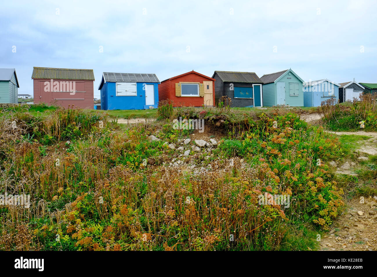Cabine sulla spiaggia, su Portland bill, Dorset, Inghilterra Foto Stock