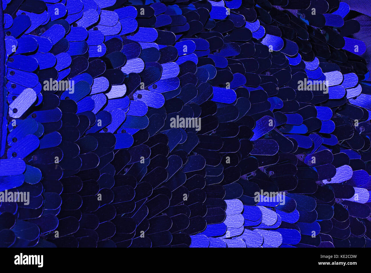 Spangle, sequin pailette sfondo. Abito a specchio panno di materiale modello di texture. Sartoria concetto di cucitura. Shiny specchiata tessuto di moda. Shiny cl Foto Stock