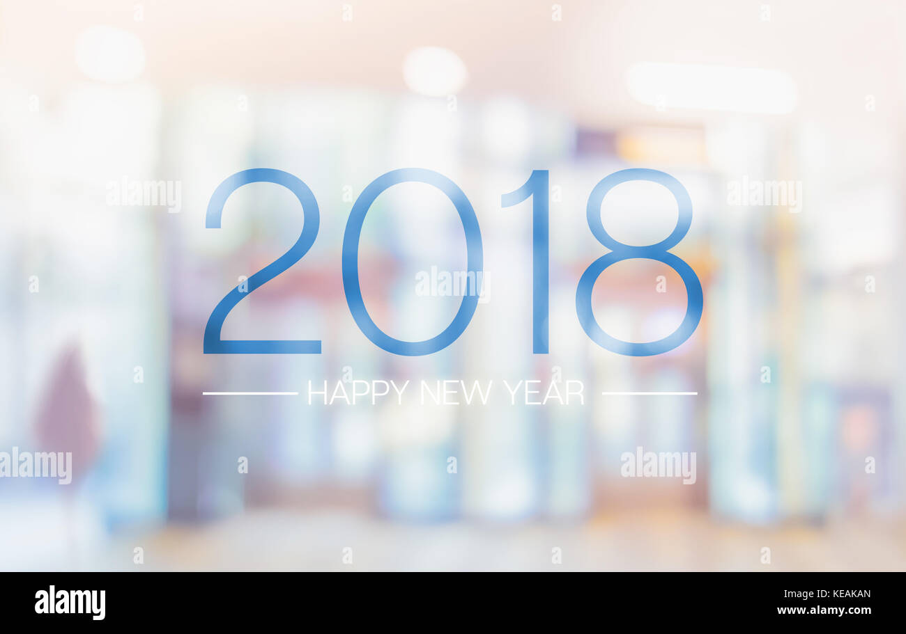 Felice anno nuovo 2018 parola su blur colore pallido convention hall ufficio edificio sfondo bokeh di fondo Foto Stock