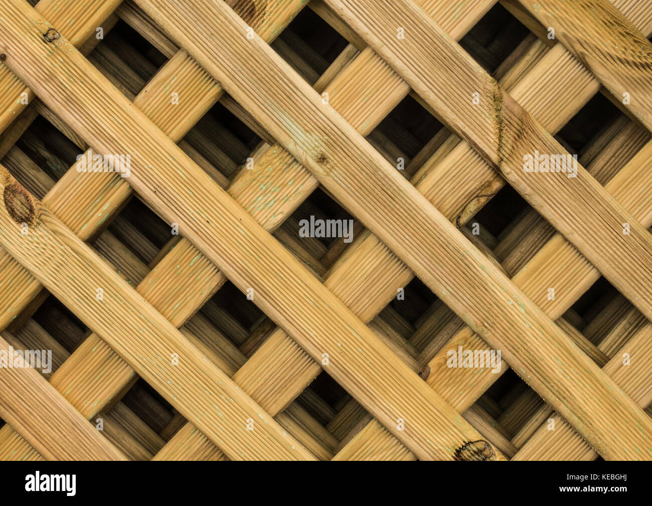 Un abstract colpo di un giardino in legno a traliccio. Foto Stock