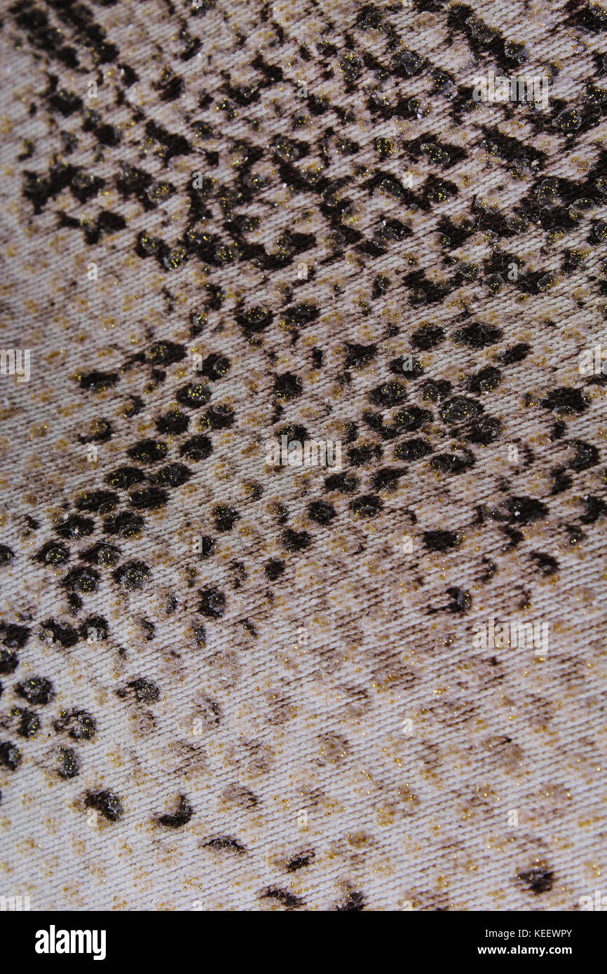 Tessuto, tela design sfondo dello sfondo. Tessuti moda come sfondo. Vestiti pattern texture closeup photo. Foto Stock