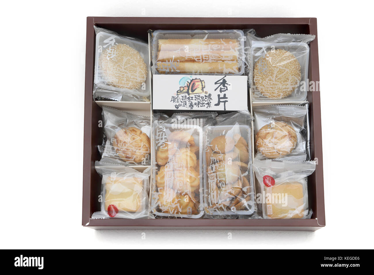 Una scatola di biscotti assortiti da Kee Wah panificio di Hong Kong Foto Stock