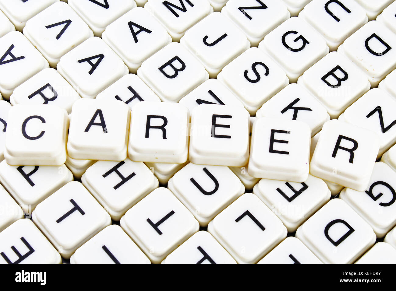 Carriera di testo parola cruciverba. Lettere dell'alfabeto blocchi texture di gioco dello sfondo. Foto Stock