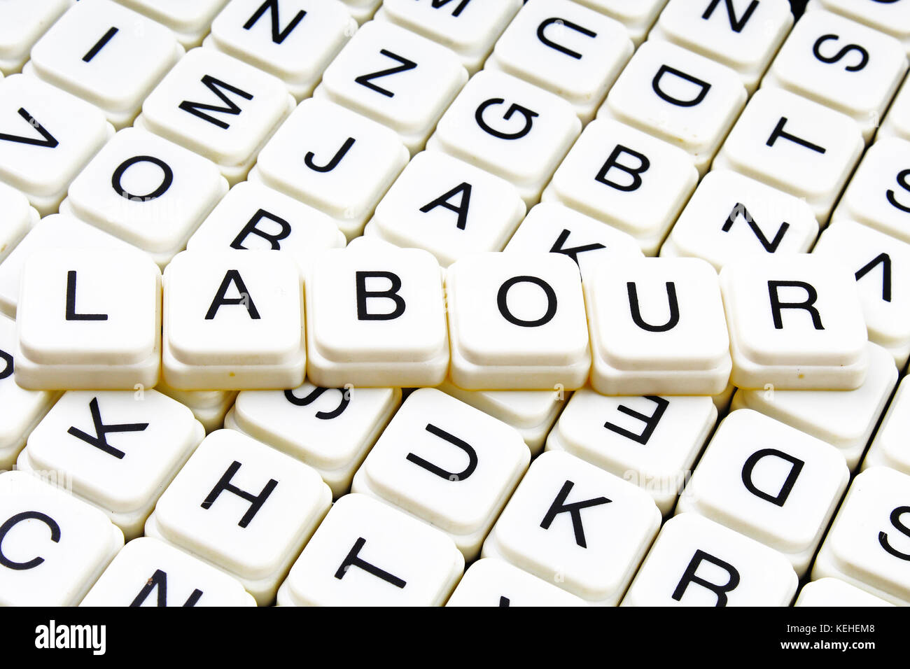 Il lavoro di testo parola cruciverba. Lettere dell'alfabeto blocchi texture di gioco dello sfondo. Foto Stock