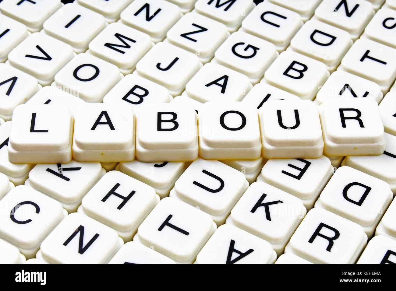 Il lavoro di testo parola cruciverba. Lettere dell'alfabeto blocchi texture di gioco dello sfondo. Foto Stock