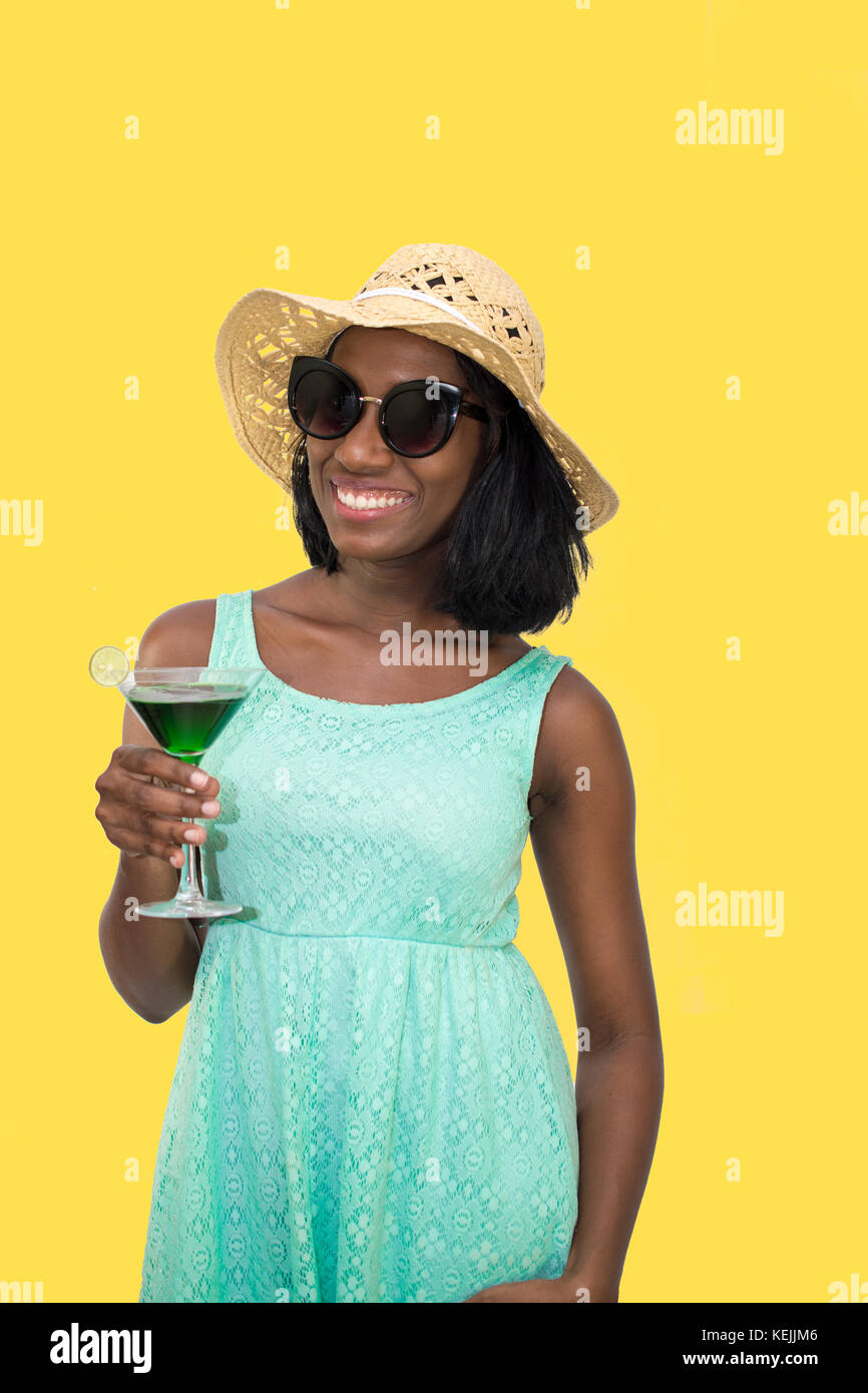 La donna nel cappello di paglia azienda martini Foto Stock