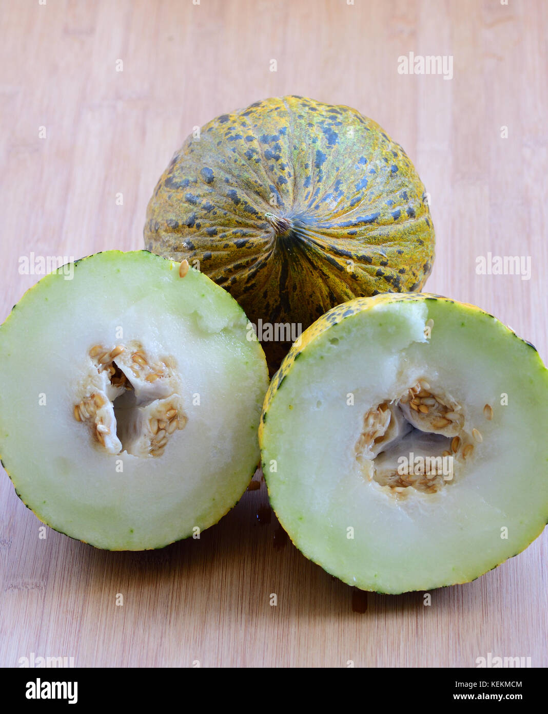 Il melone sul bordo di taglio Foto Stock