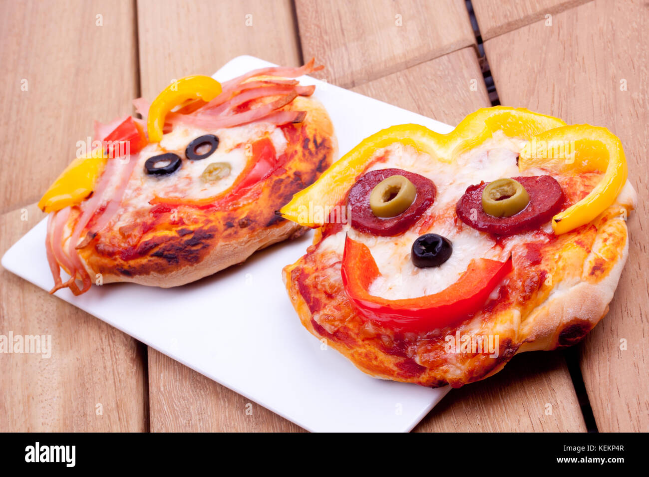 Forma della faccia la pizza Foto Stock