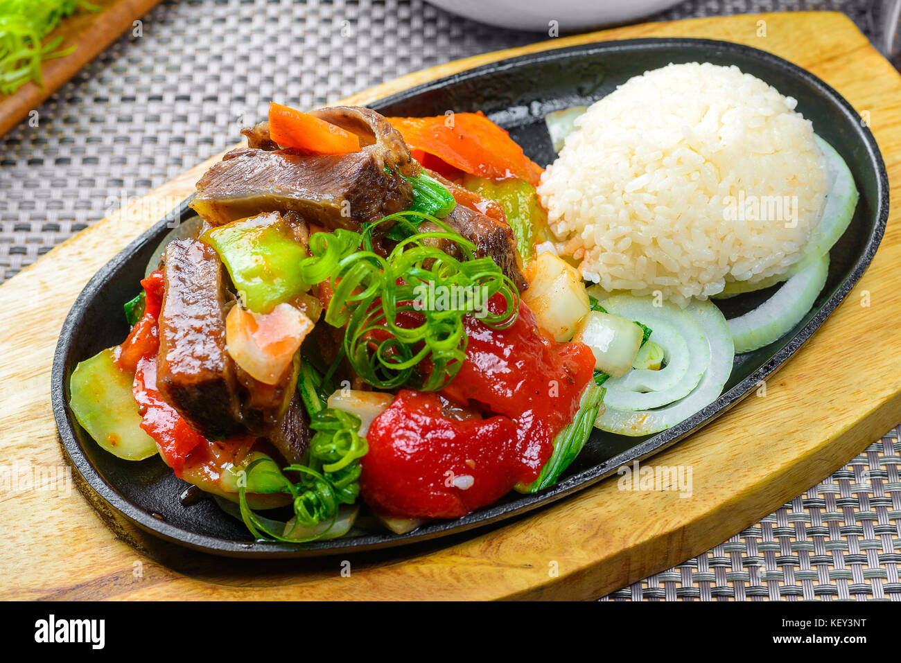 Carne arrosto con riso Foto Stock