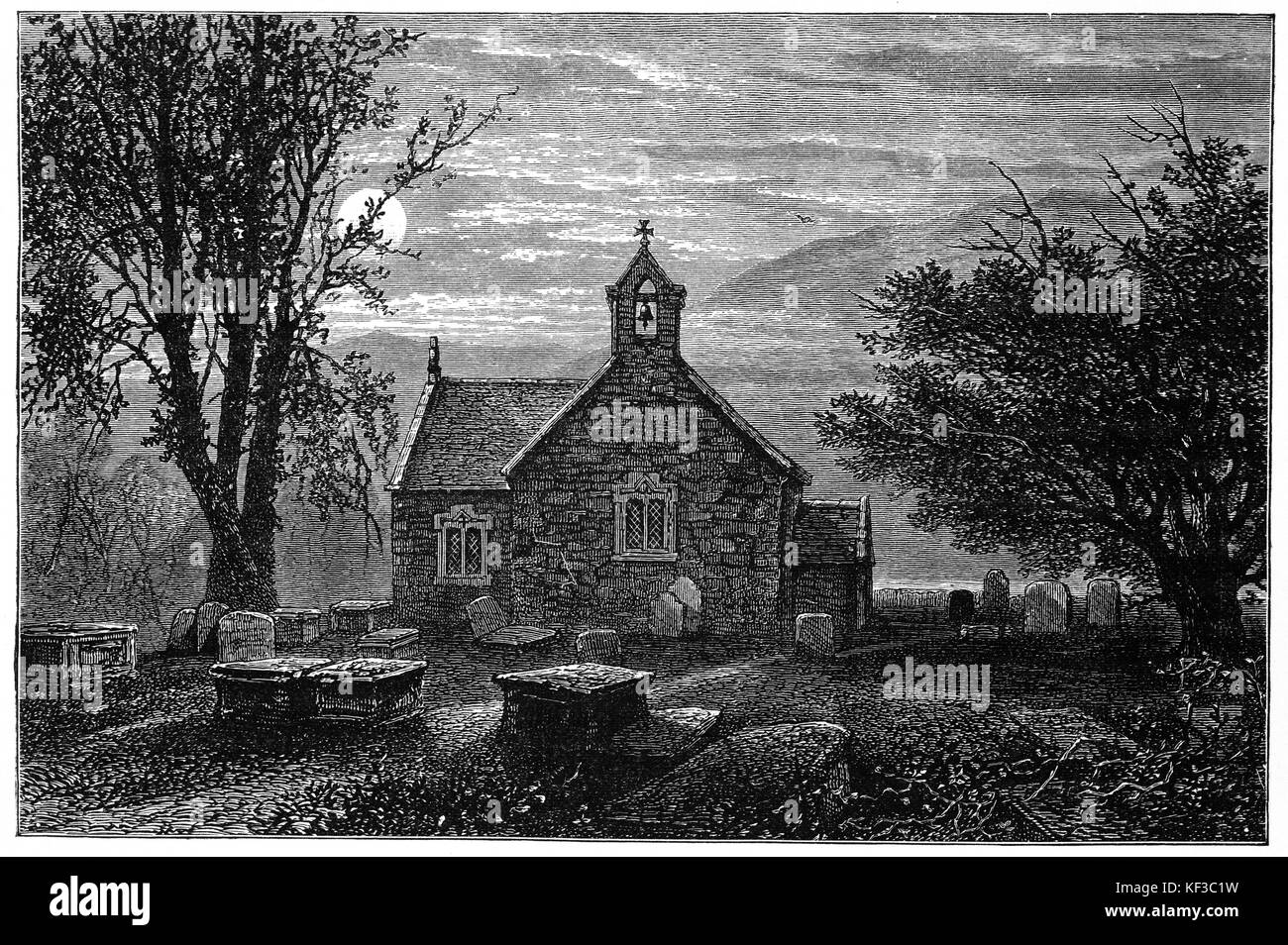 1890: Moonlight sopra la vecchia chiesa in Bettwys Y; Coed Snowdonia National Park; Gwynedd; Galles del Nord Foto Stock