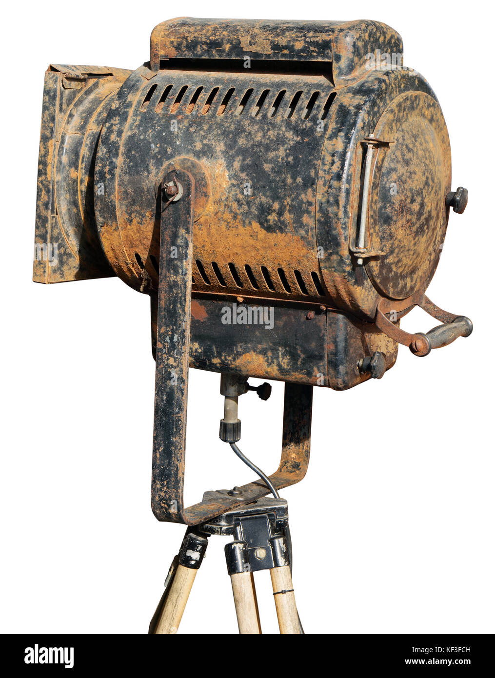 Un arrugginito vintage retrò di cinema o teatro spotlight sul treppiede - lato inverso. isolato su bianco con patch Foto Stock