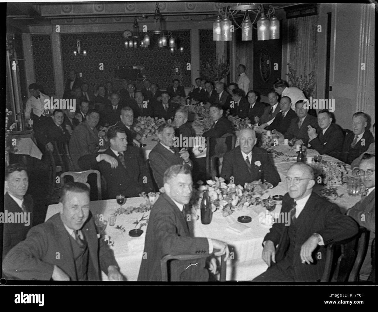 La cena presso gli Ushers, ospitata dai teatri Acme Kings Union, mostra un incontro sociale all'inizio del XX secolo, che riflette l'atmosfera sociale e l'industria dell'intrattenimento di quel tempo. Foto Stock