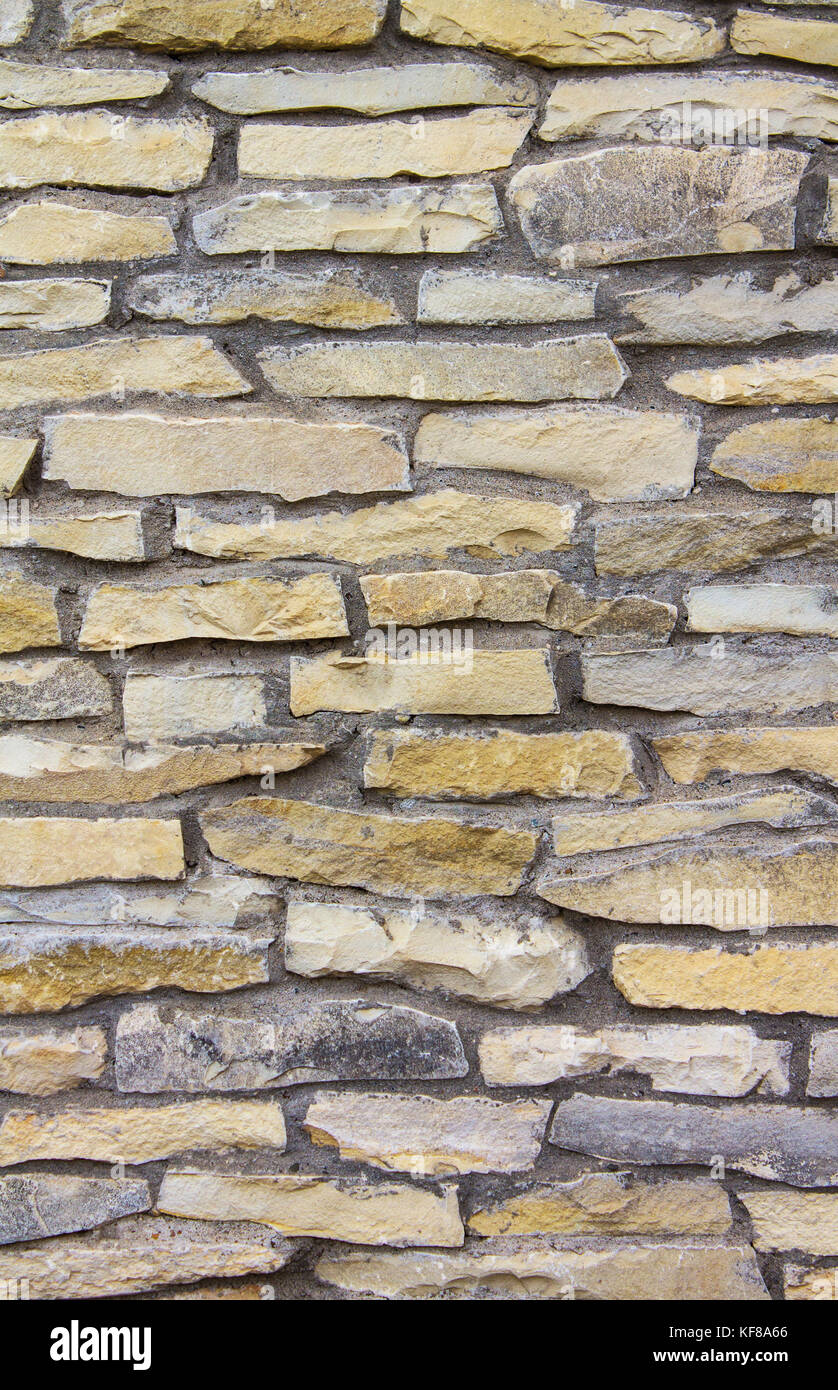 Fatti a mano decorativo muro di pietra per lo sfondo. Foto Stock