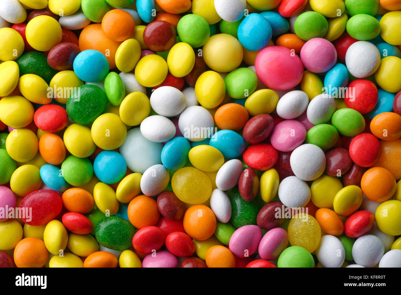Gli sfondi e texture: un sacco di variopinte round caramelle, confetteria abstract Foto Stock