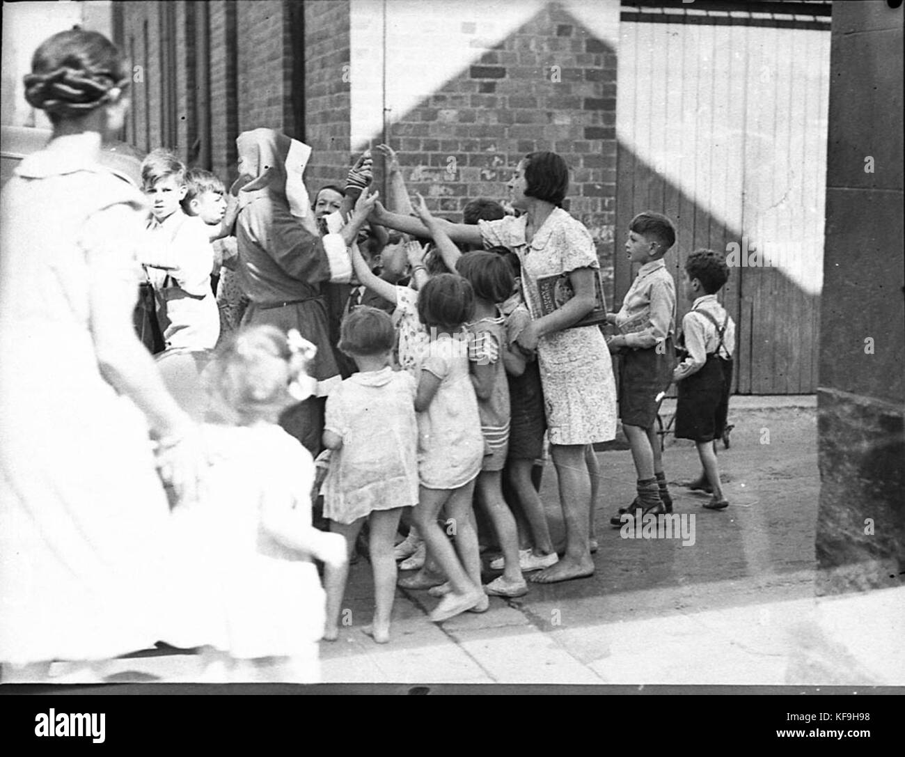 74935 Methodist Missione Natale visita ai poveri Foto Stock