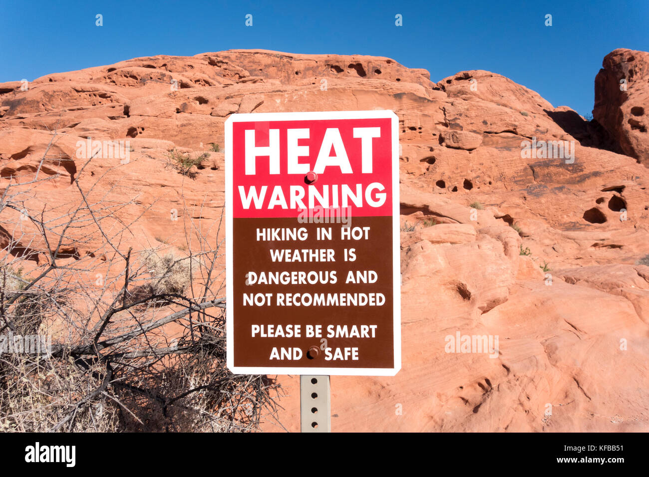 La Valle del Fuoco del Parco Statale Nevada calore segno di avvertimento Foto Stock