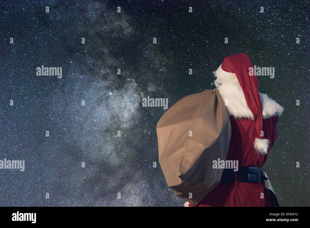 Babbo Natale con sacco. Luci di Natale magiche Foto Stock