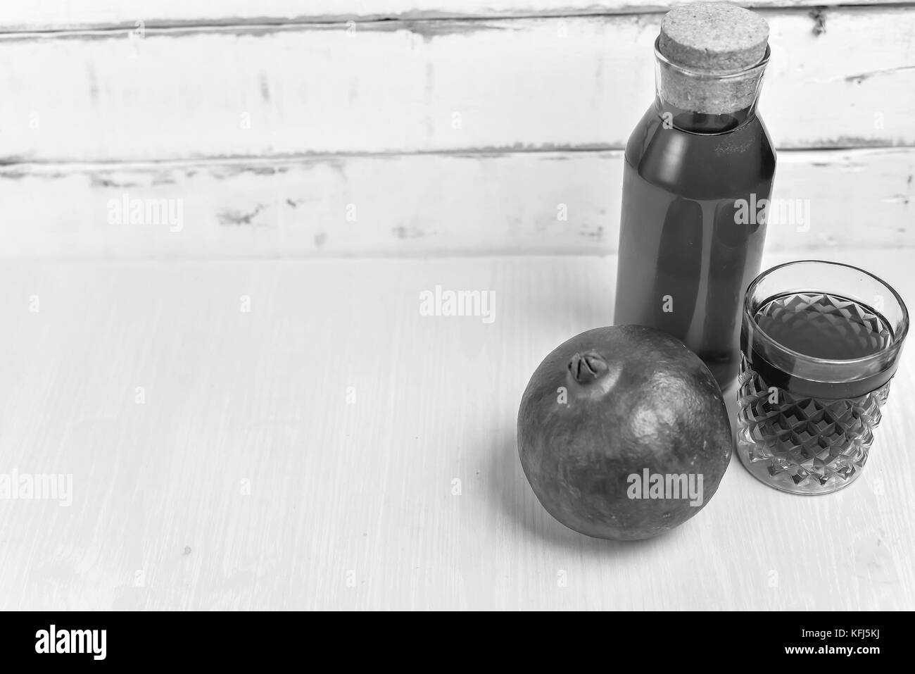 Composizione del melograno con succo Foto Stock